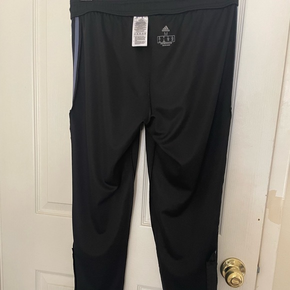 Adidas black with light blue strips. - Picture 8 of 11